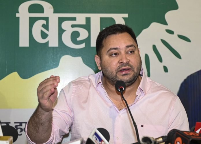 Tejasvi-1-696x499 Tejashwi Yadav speaking to reporters about the INDIA bloc manifesto