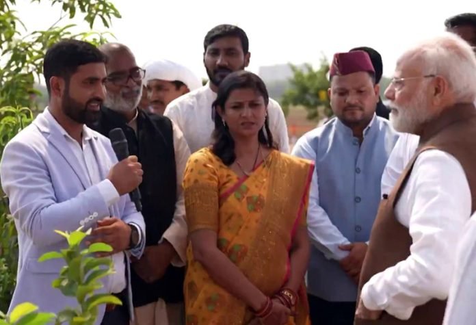 page1-4-7-696x475 PM Modi interacts with farmers during the PM Dhan Dhaanya Krishi Yojana launch